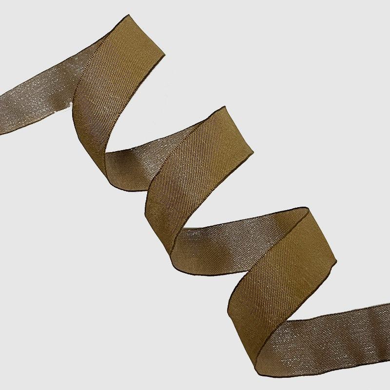 Taupe bronze wired ribbon folded in zigzag showing muted warm neutral with matte finish — Sivonna earth tone wedding ribbon