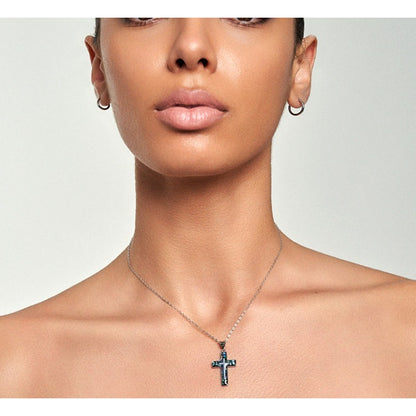 Model wearing Abalone Shell Mosaic Cross Pendant Necklace in silver, front-facing neckline close-up — iridescent shell cross pendant by Sivonna
