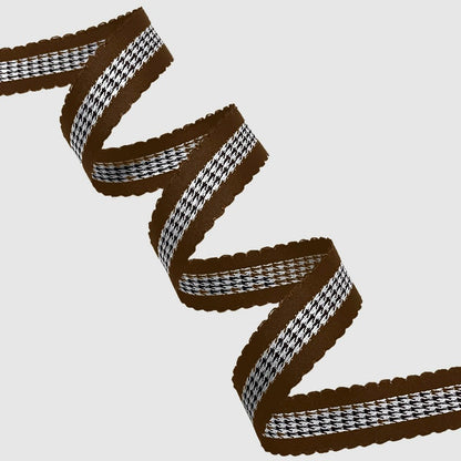 Tan wired ribbon in zigzag fold showing warm sand tone with matte textured finish — Sivonna gift wrapping ribbon