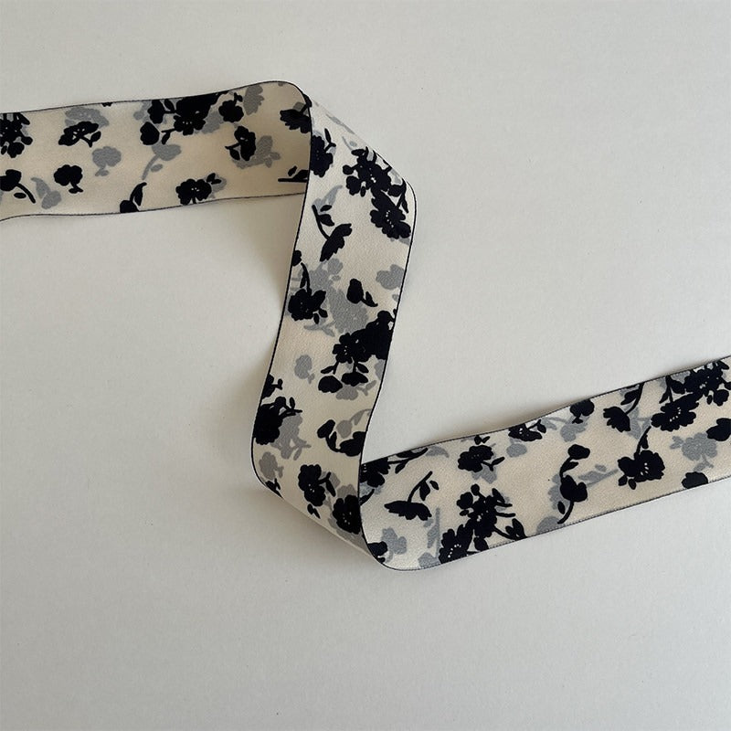 Double-sided white ribbon with black floral print, dark and moody ribbon for gothic or autumn decor