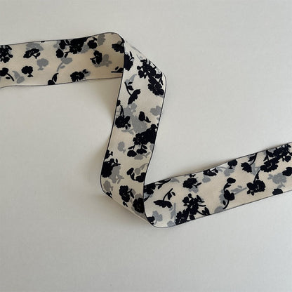 Double-sided white ribbon with black floral print, dark and moody ribbon for gothic or autumn decor