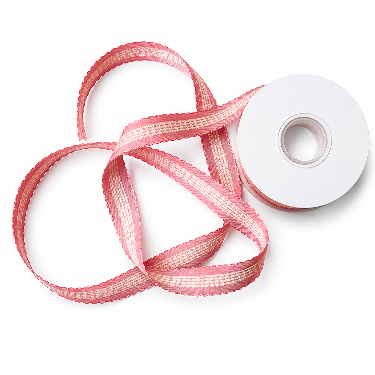 Dusty rose satin ribbon unspooled flat showing full width and soft drape on neutral background — Sivonna craft ribbon roll
